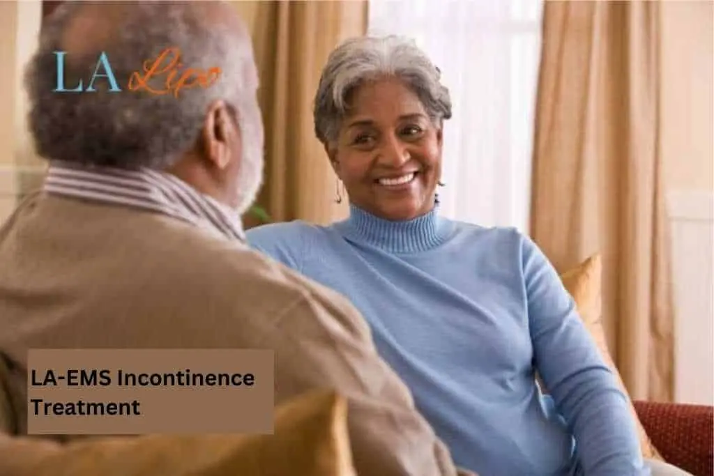 Couple sat smiling at each other - LA-EMS treatment Kingston Hill