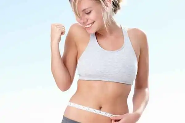 woman happy after fat reduction treatment Kingston Hill